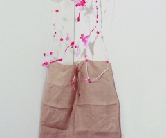 Pink trellis holding linen 72dpi for website